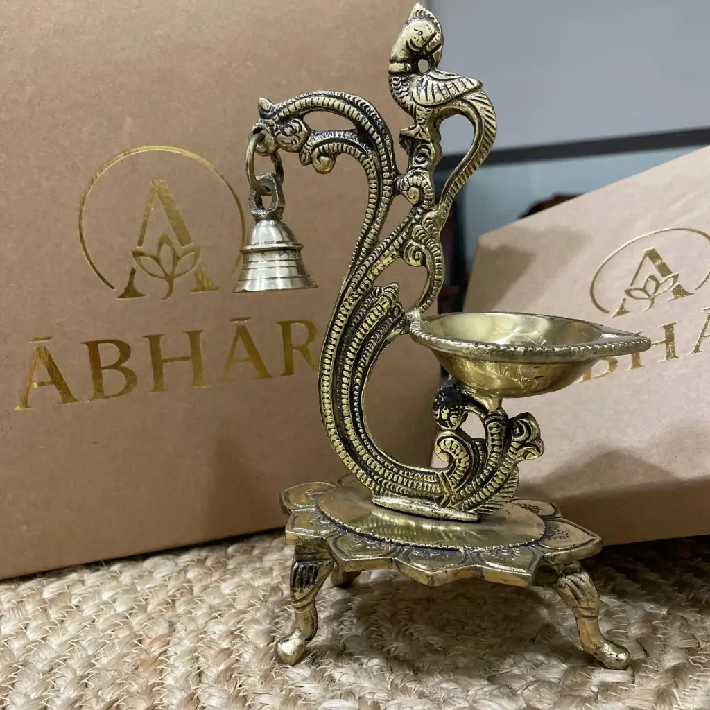 Brass Peacock Diya – Light of Positivity & Protection 