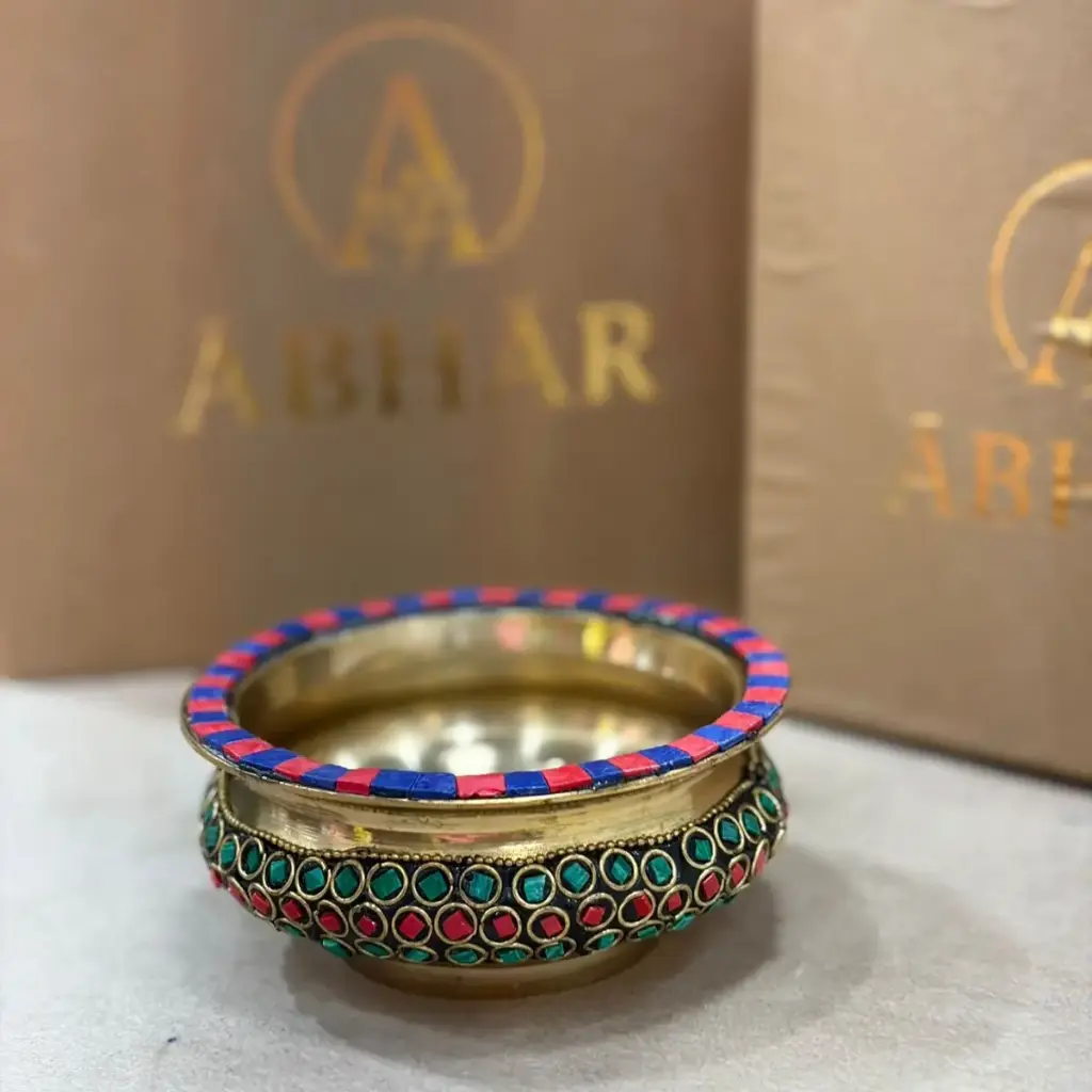 Brass urli (stone work)