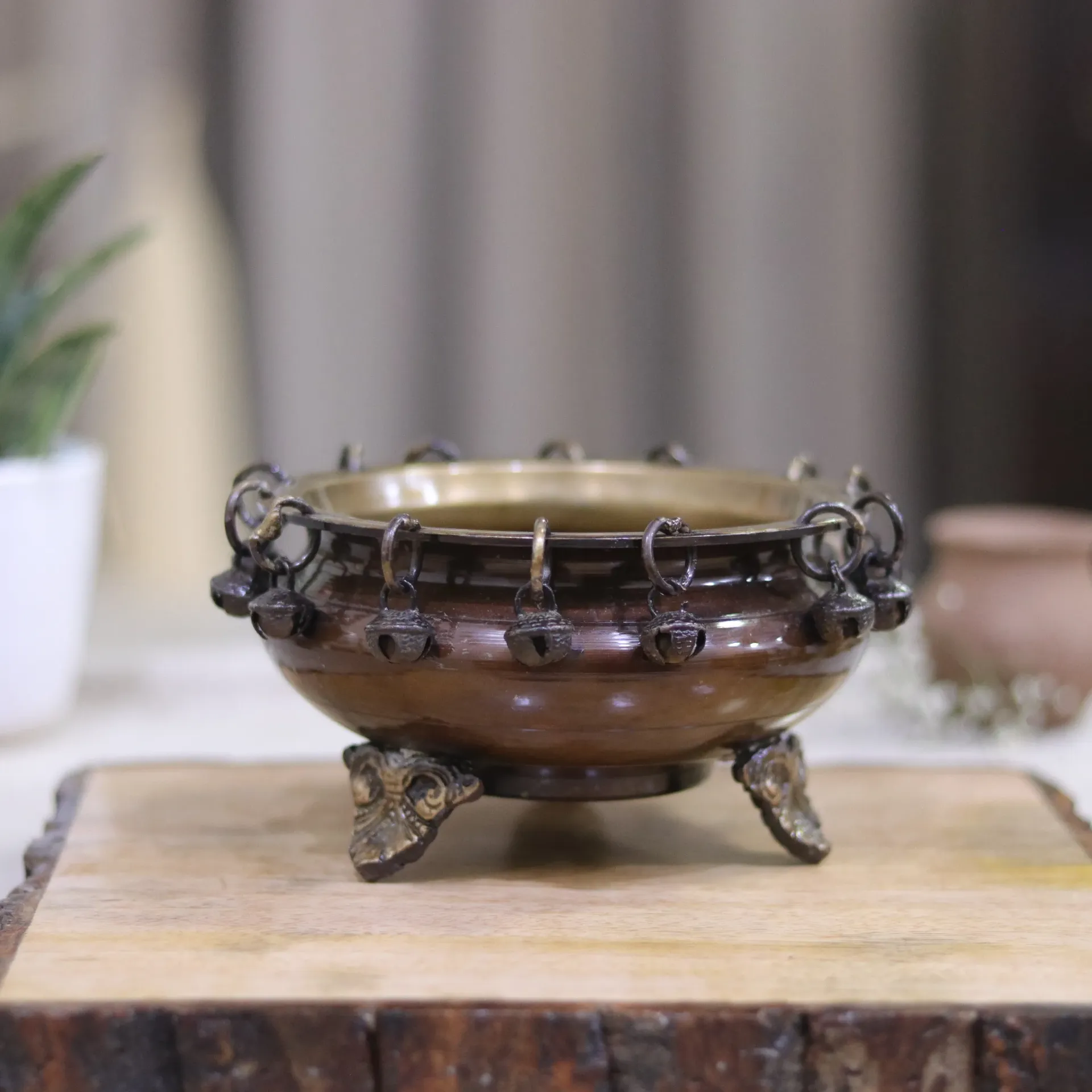 Brass Urli with Ghungroos and stand– Echoes of Elegance