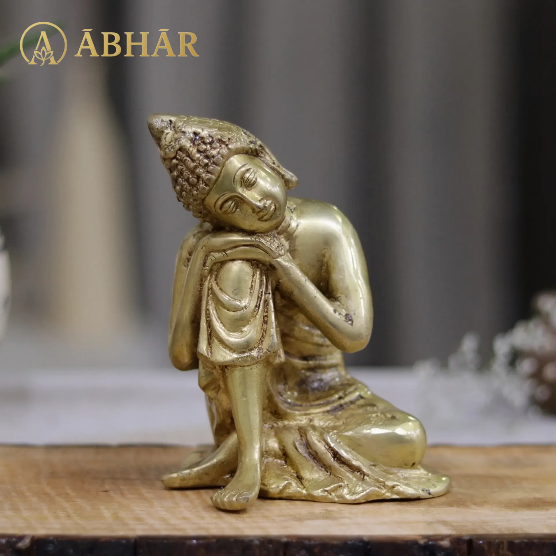 Brass Buddha Lean on knee |